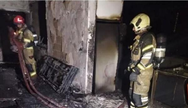 نجات 12 نفر از آتش سوزی خیابان میرداماد